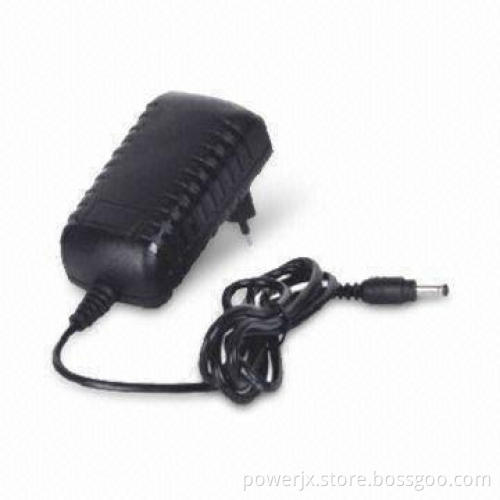 AC/DC Adapter with 25V Voltage, Over-voltage Protection, Measures 74.5 x 42 x 30mm